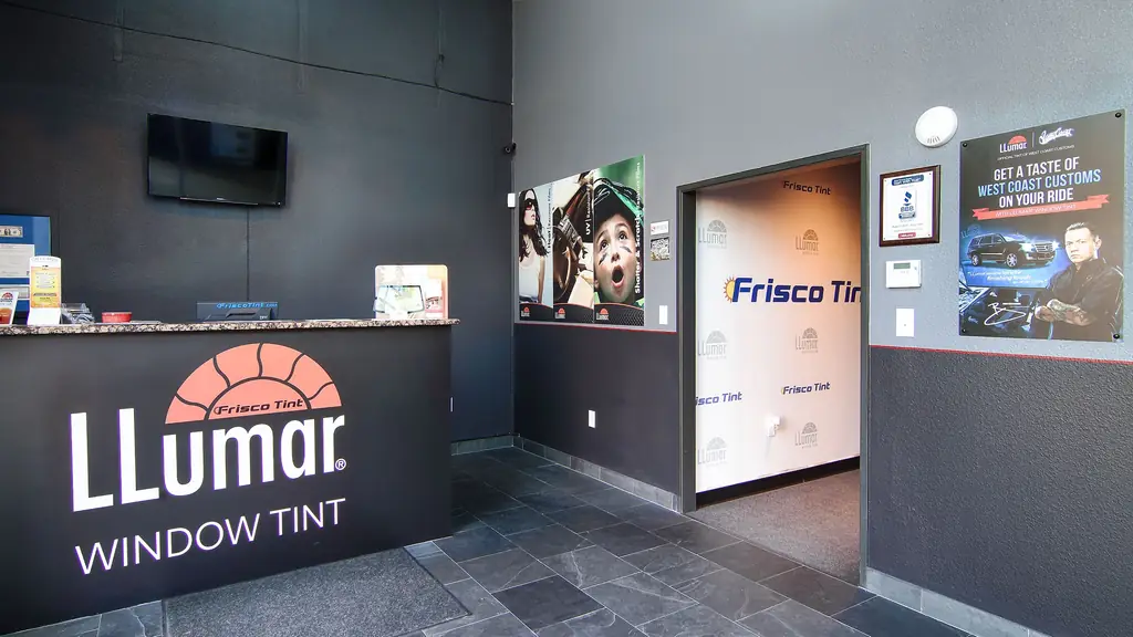 The Frisco Tint reception counter, with LLumar branding and film samples